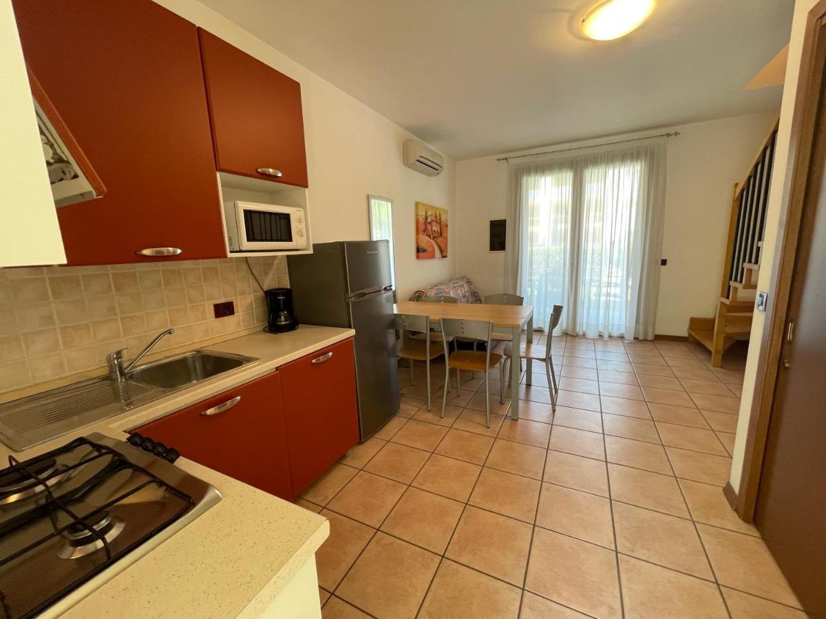 Villaggio Ai Ginepri - Agenzia Cocal Каорле Екстер'єр фото